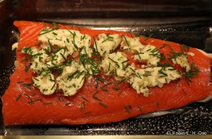 salmon topped with compound butter and chives