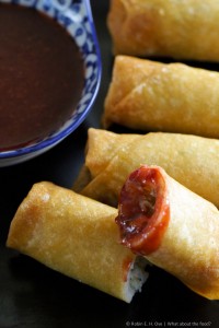 Eggroll dipped in Plum Sauce